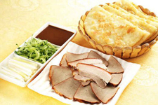 <a href=/shicai/rouqin/XunRou/index.html target=_blank><u>熏肉</u></a>大饼的做法